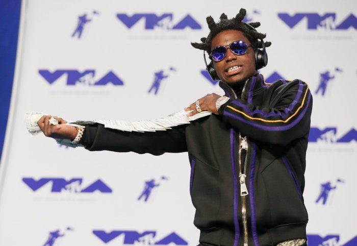 Kodak black arrested at rolling loud festival on weapons charges report