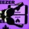 This photograph taken on January 13, 2025 in Toulouse shows headphones beside a smartphone and a computer screen displaying the logo of the French music streaming platform Deezer.